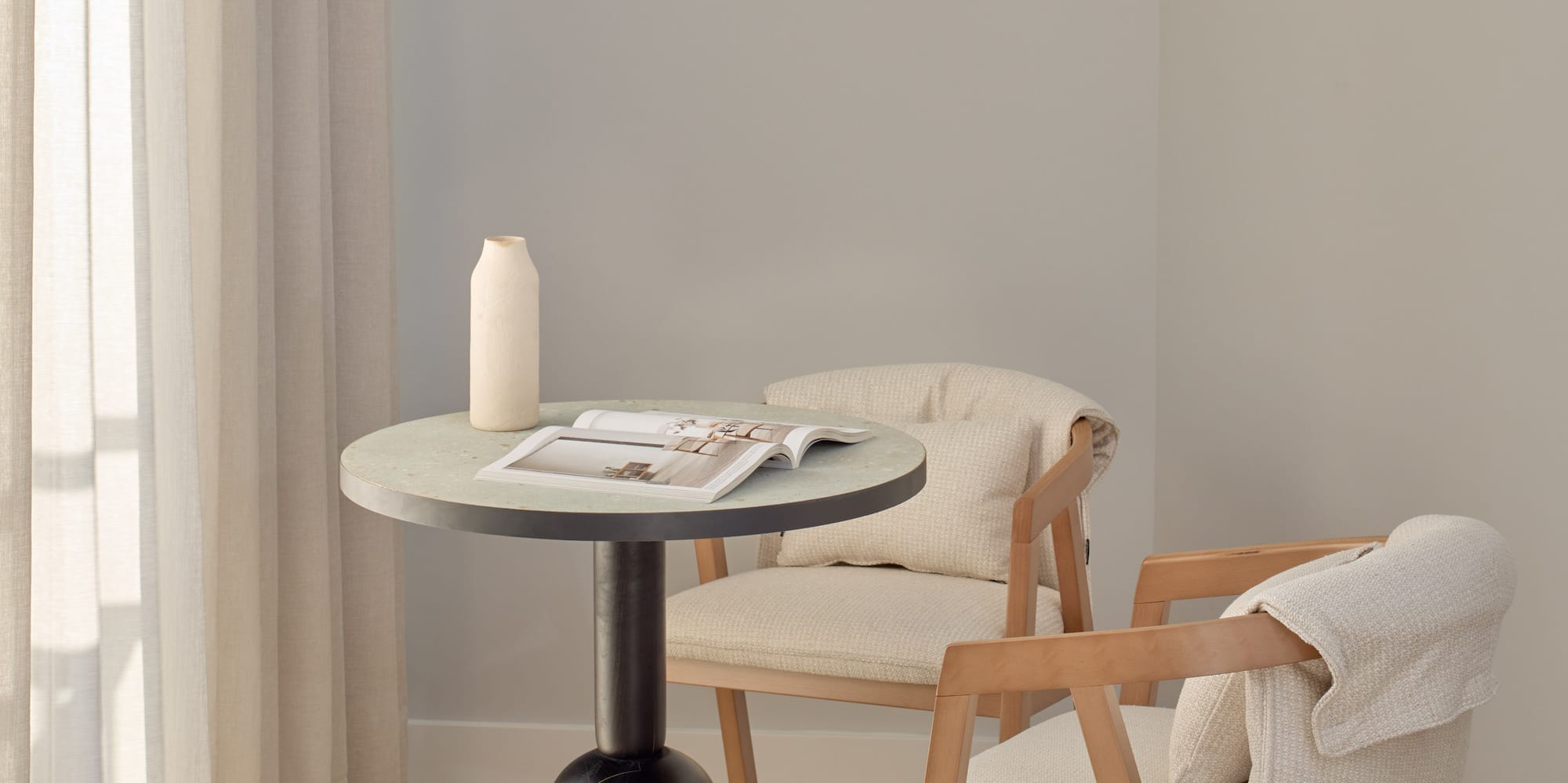 a table and chairs in a room