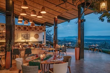 a restaurant with tables and chairs