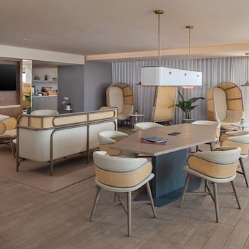 a room with a table and chairs