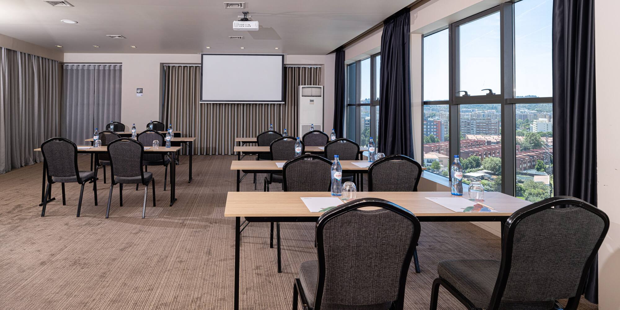 a room with tables and chairs