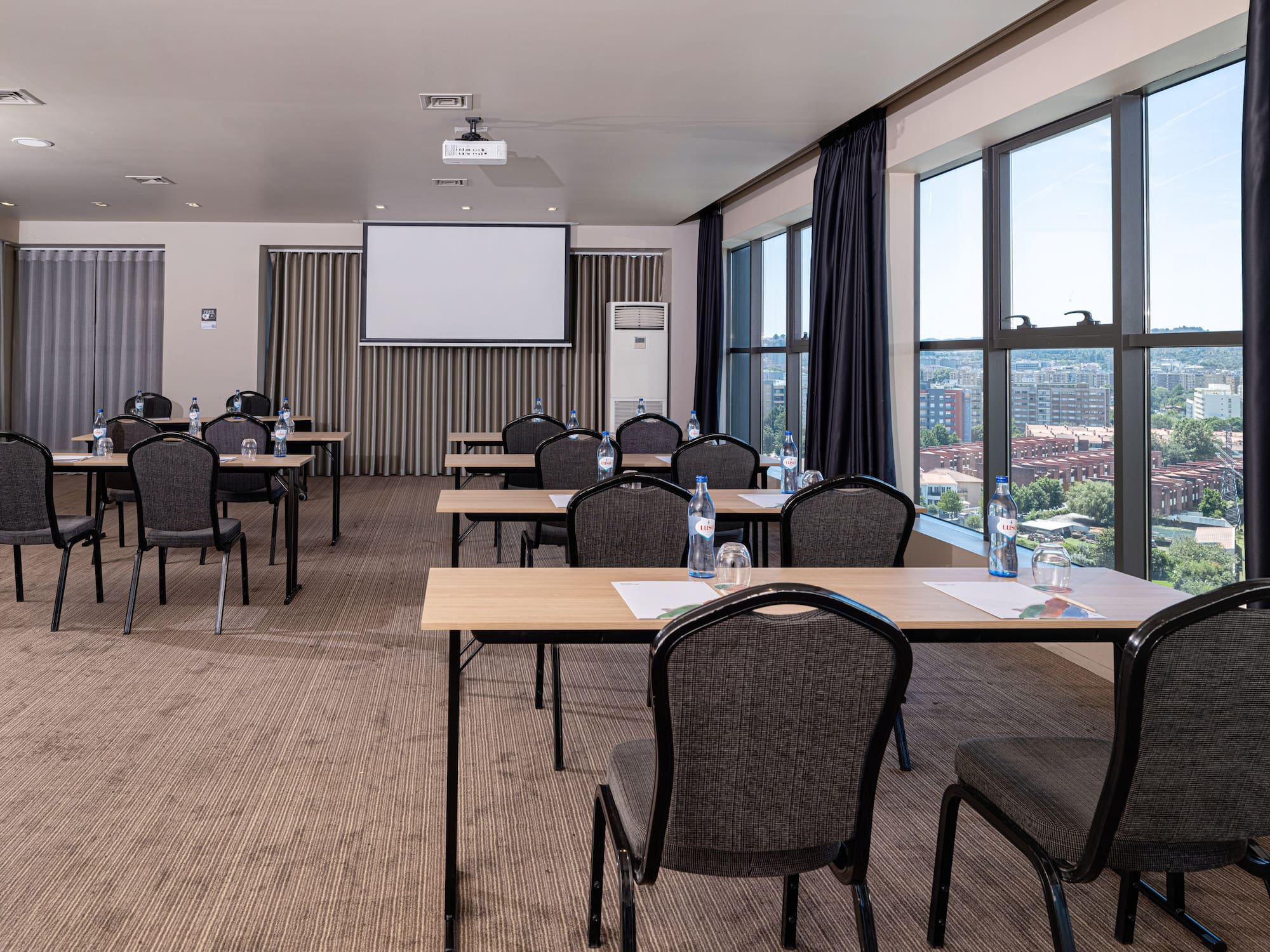a room with tables and chairs