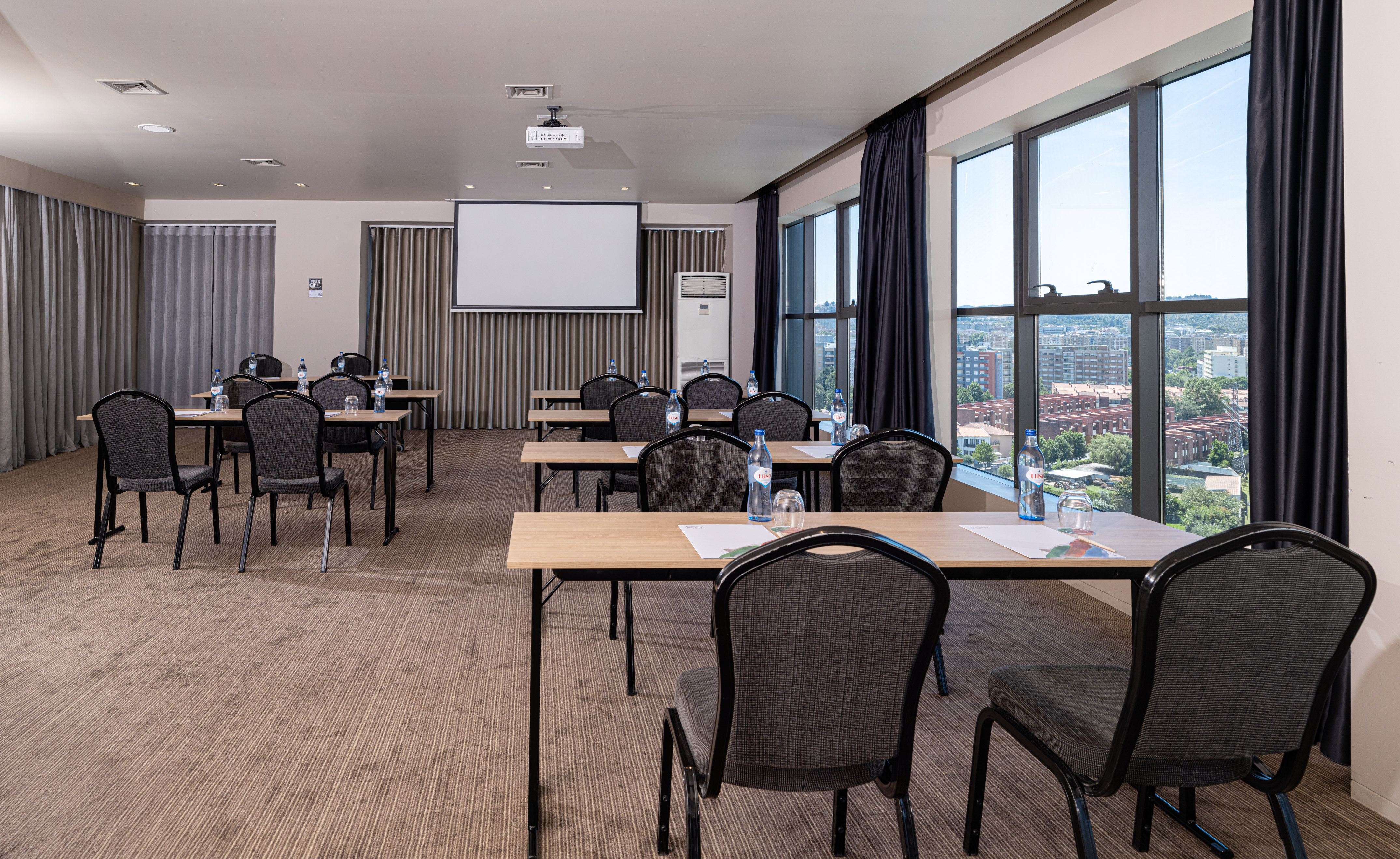 a room with tables and chairs