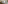 Modern hotel room with king bed, illuminated headboard, and city waterfront view.