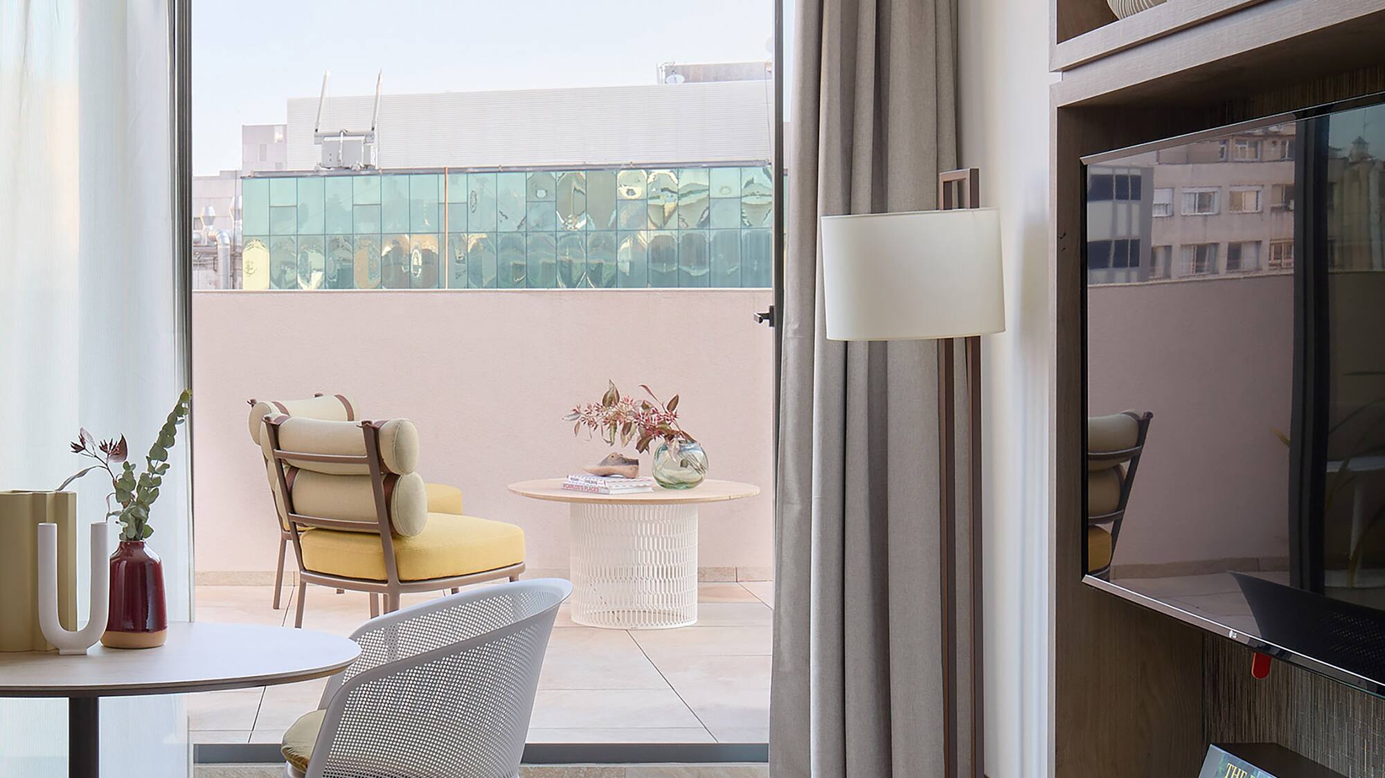 a room with a tv and a table