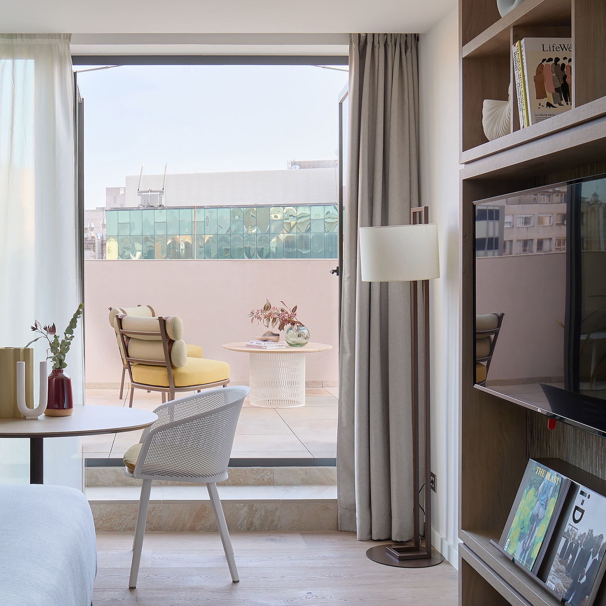 a room with a tv and a table