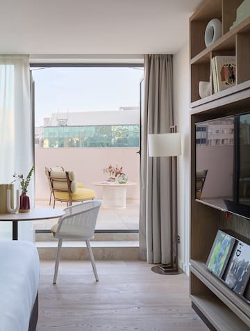 a room with a tv and a table