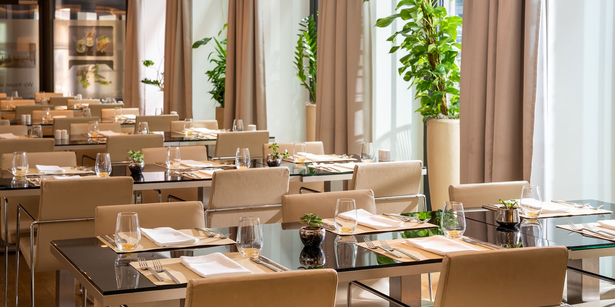 a restaurant with tables and chairs