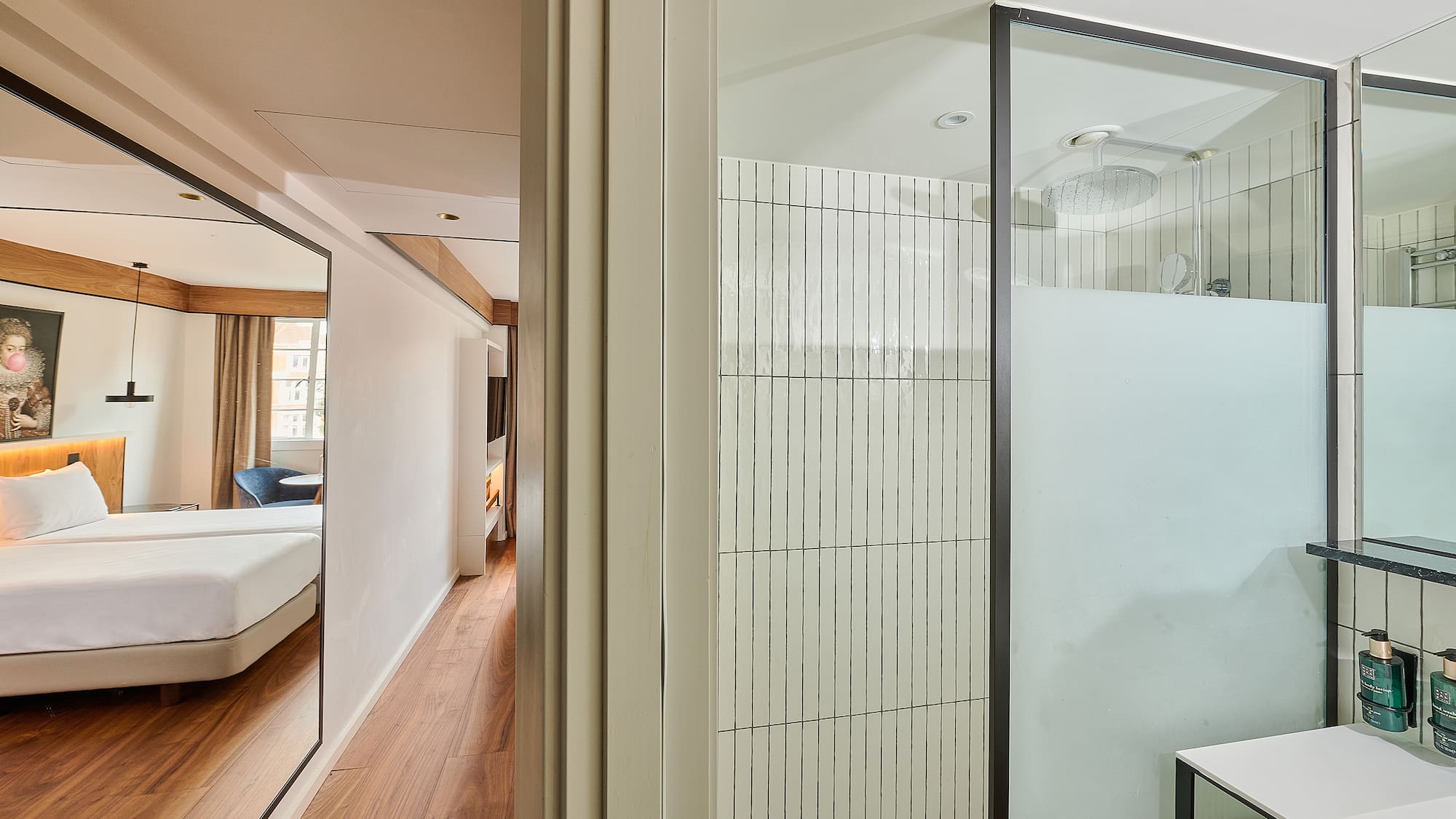 a room with a shower and a bed