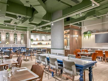 a room with tables and chairs