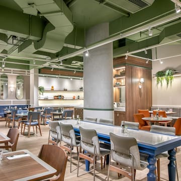 a room with tables and chairs