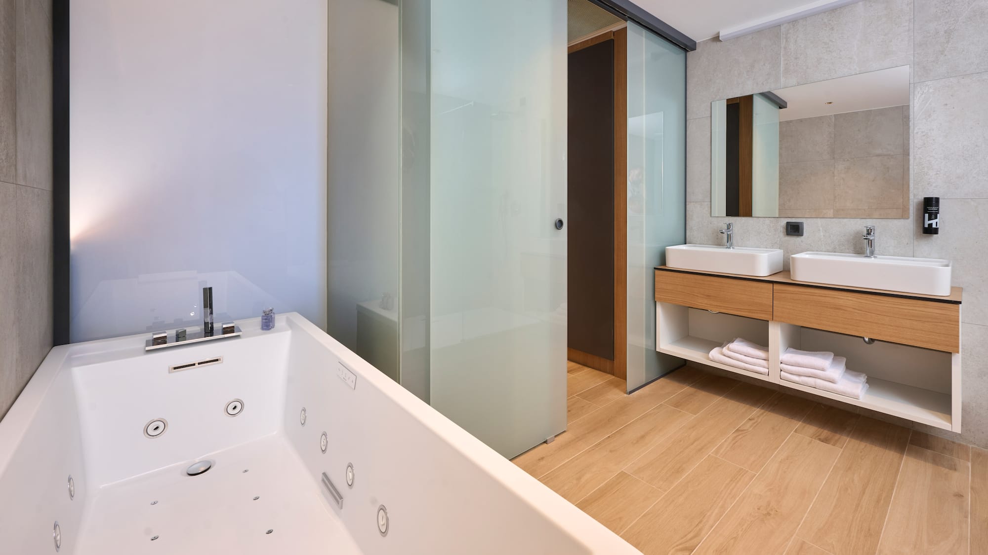 a bathroom with a bathtub and sink