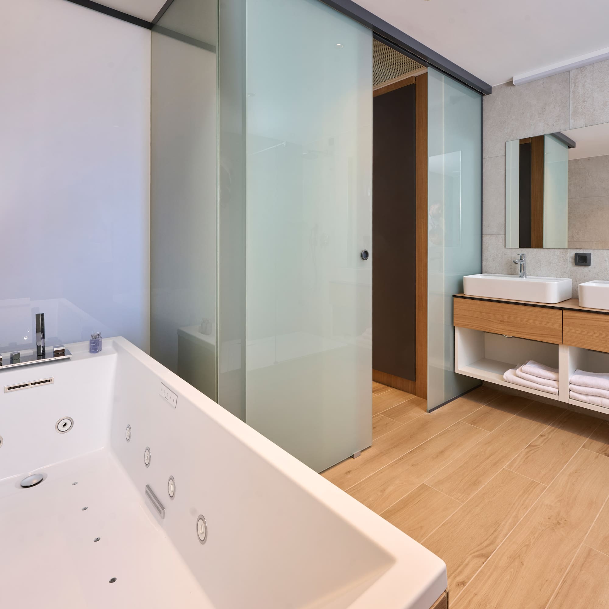 a bathroom with a bathtub and sink