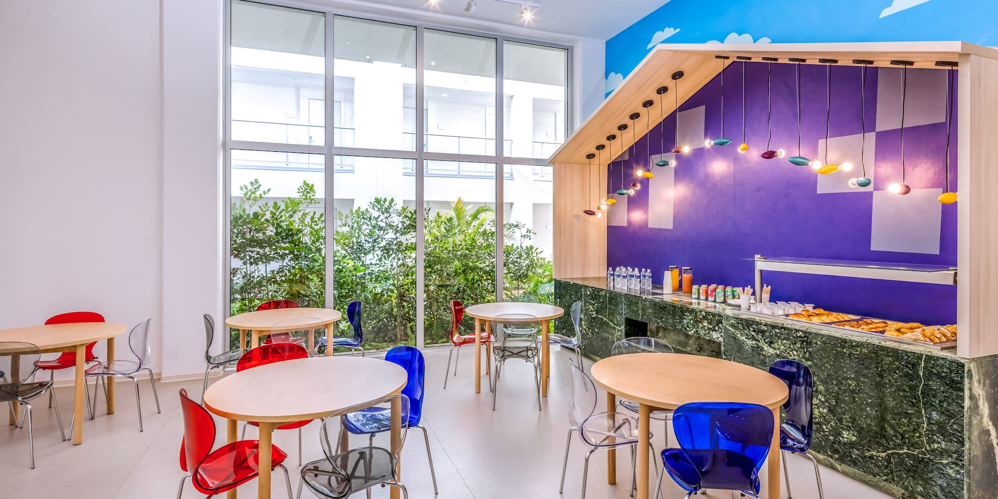 a room with tables and chairs