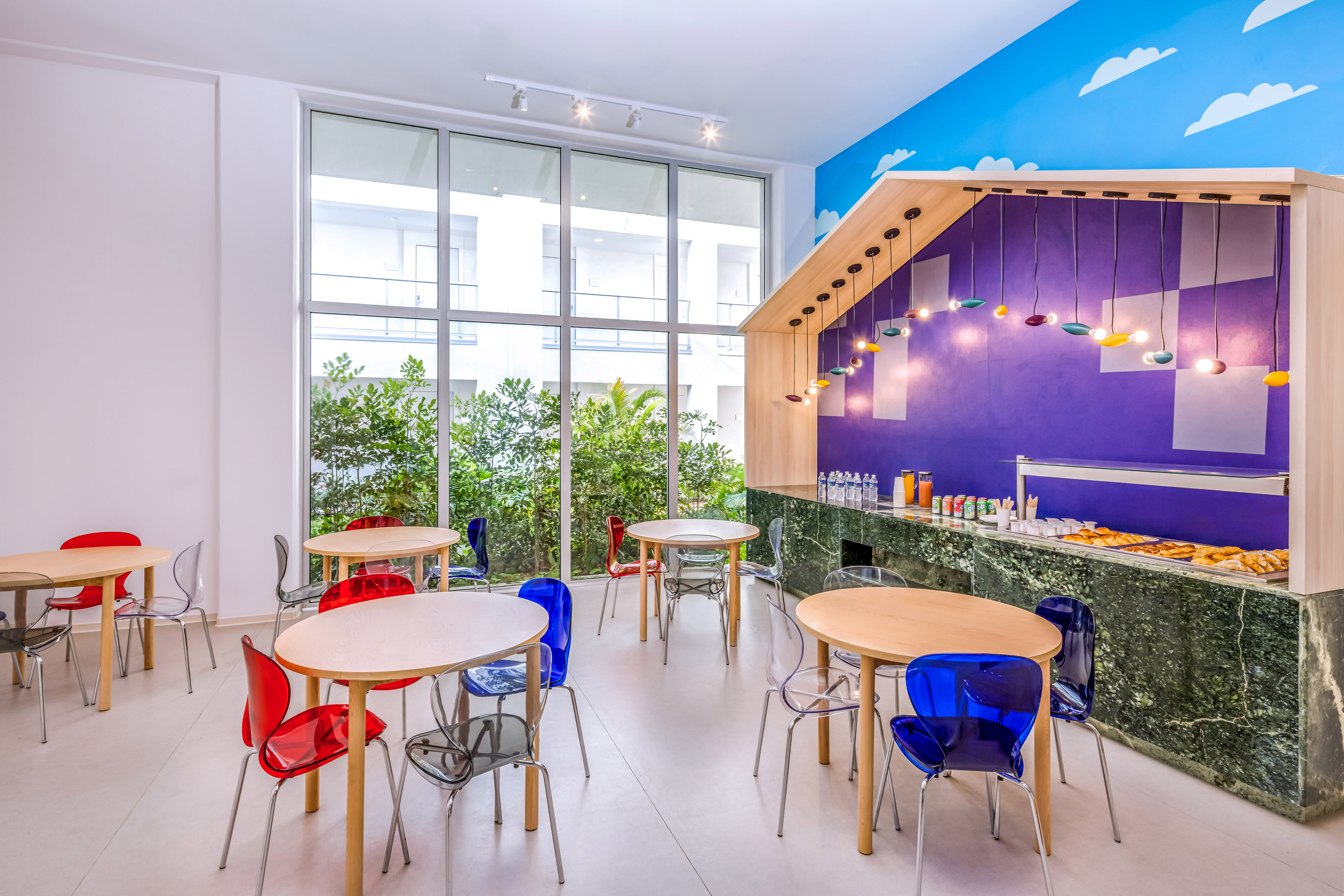 a room with tables and chairs