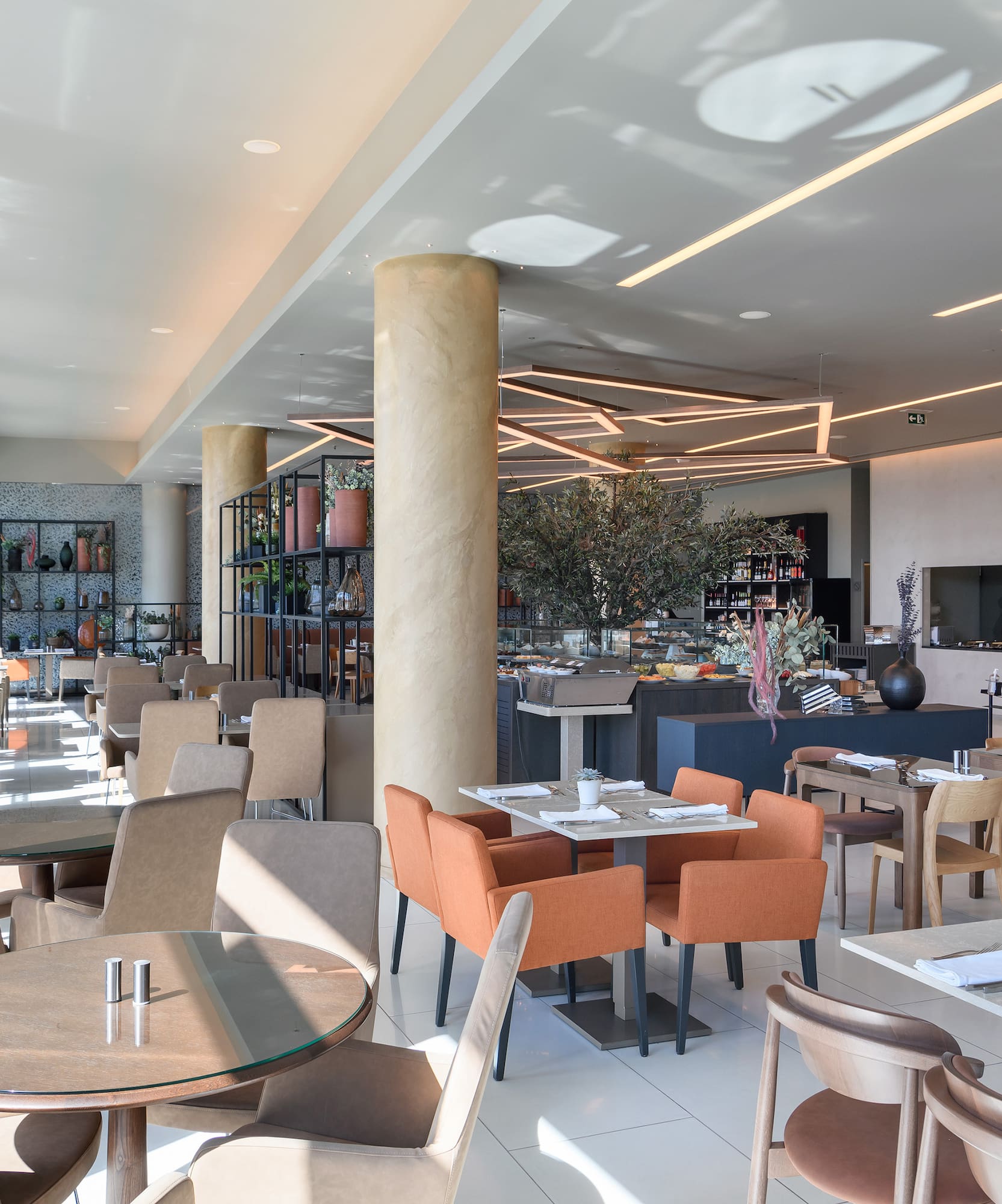 a restaurant with tables and chairs