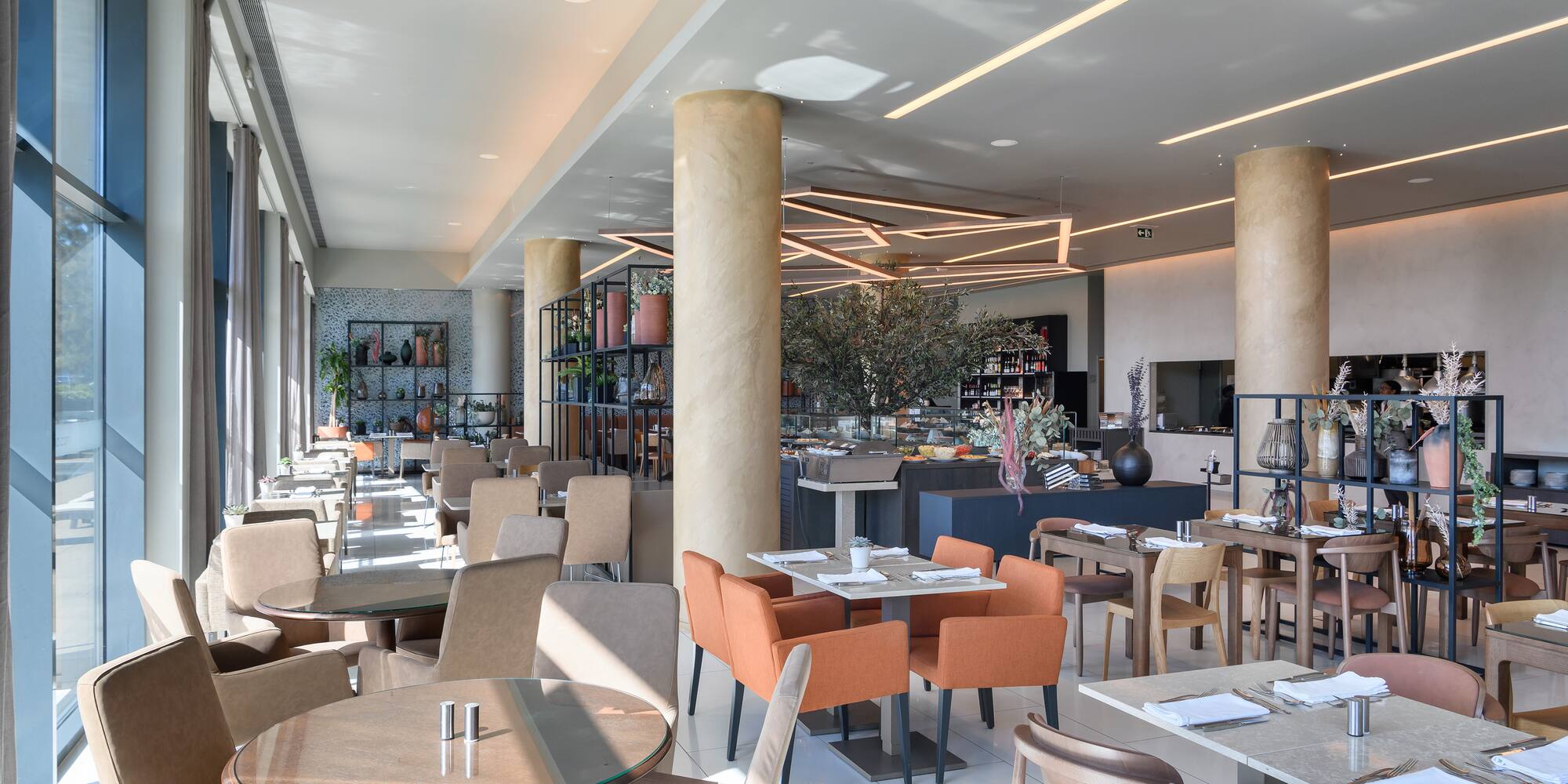 a restaurant with tables and chairs