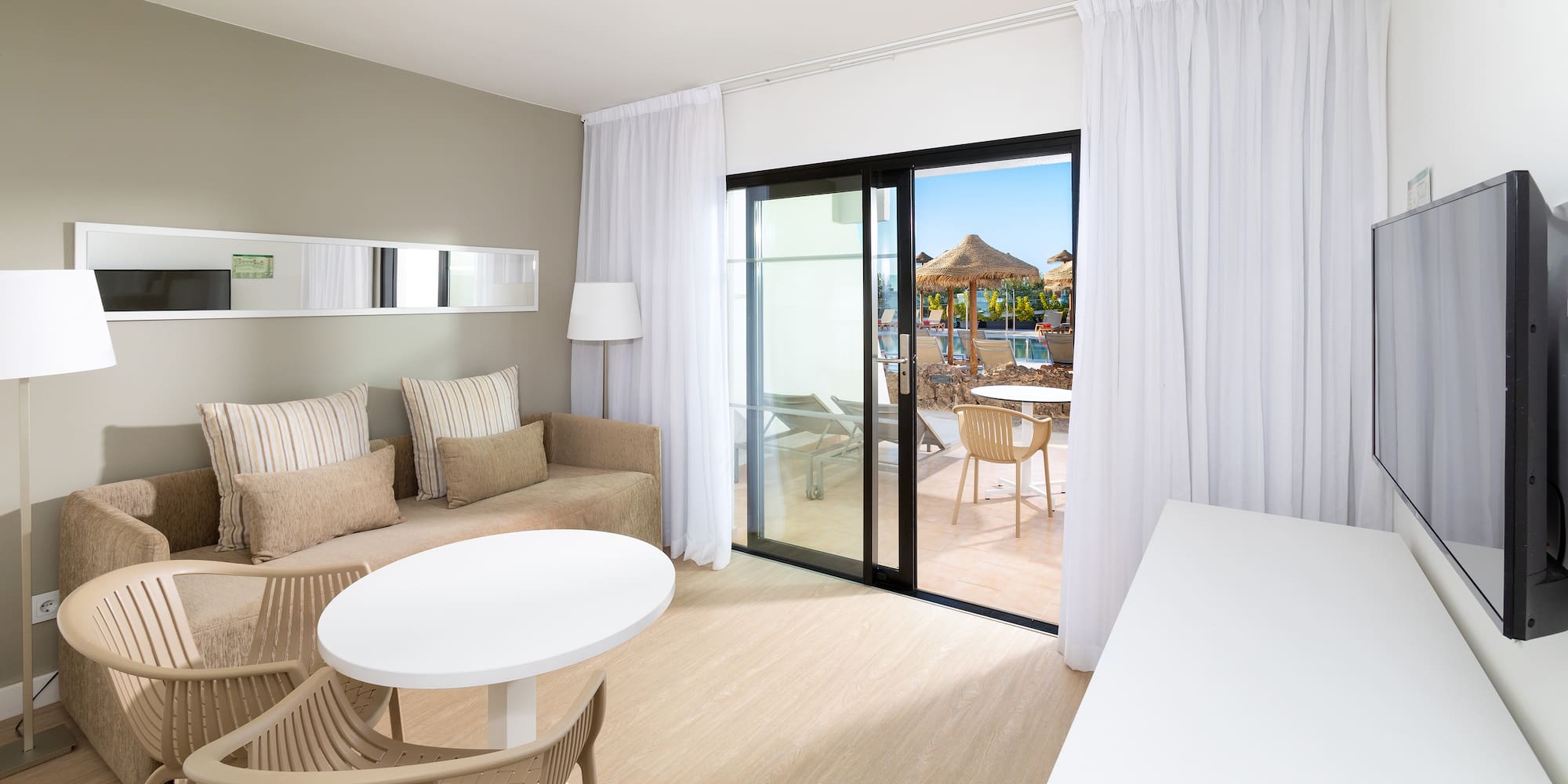 a room with a table and chairs