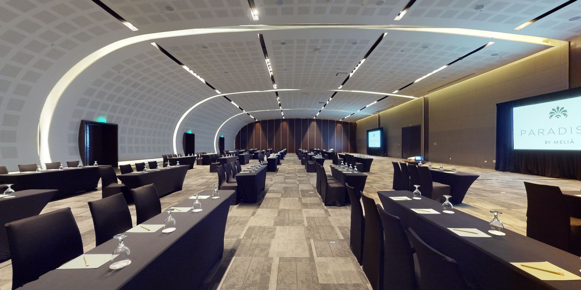 a room with tables and chairs