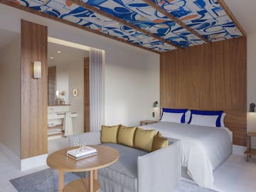 a room with a bed and a couch