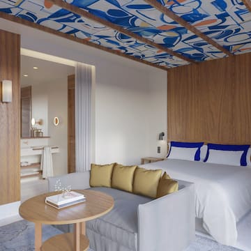 a room with a bed and a couch
