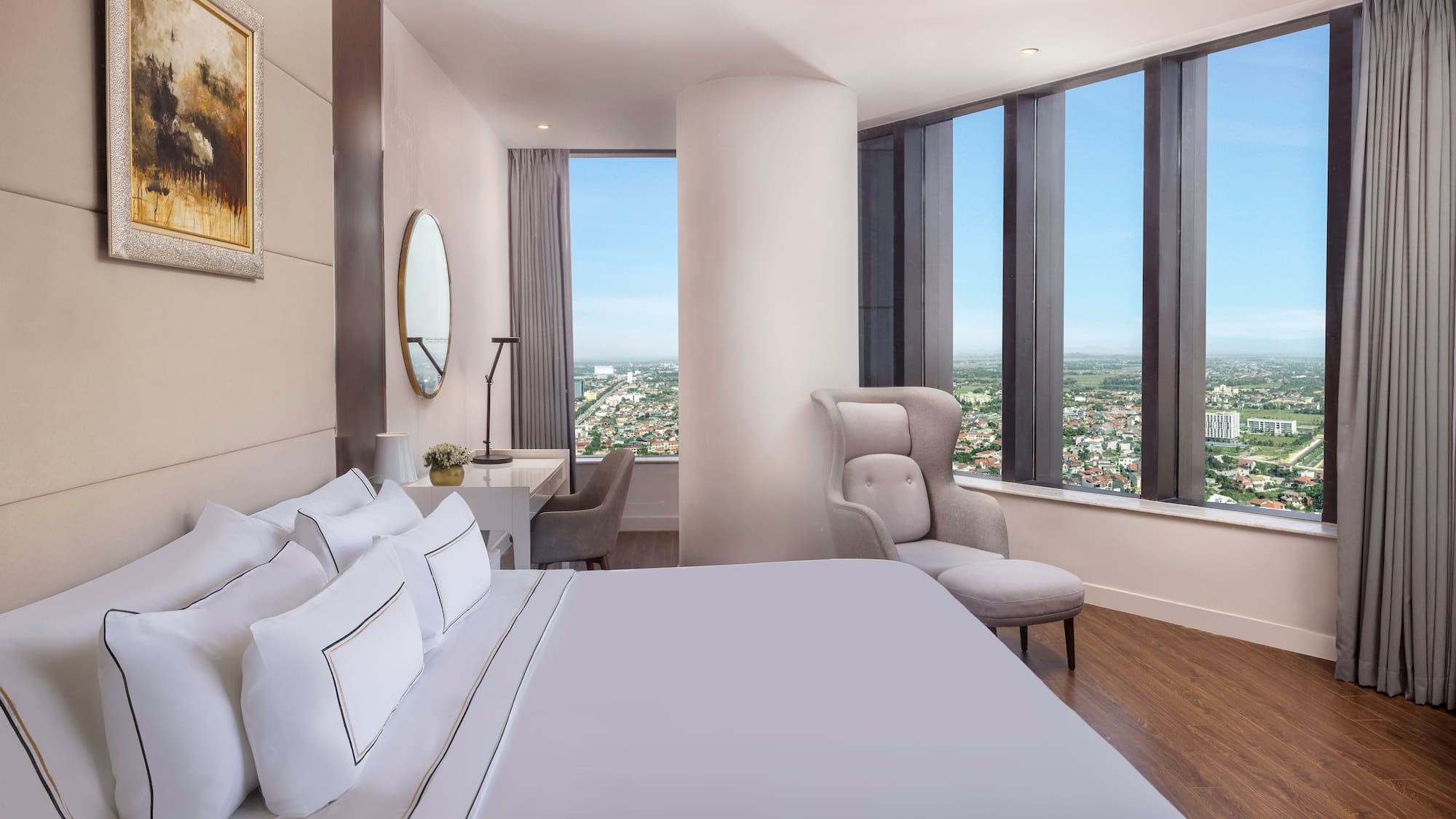 a bedroom with a large window and a large bed