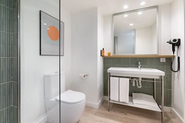 a bathroom with a sink and toilet
