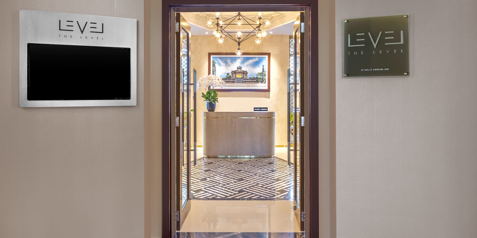 a hallway with a door and a mirror