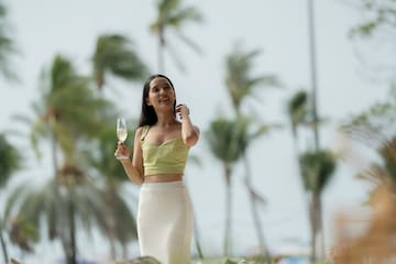 a woman holding a glass of champagne