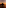 Es Vedra island silhouette at sunset over the Mediterranean Sea.