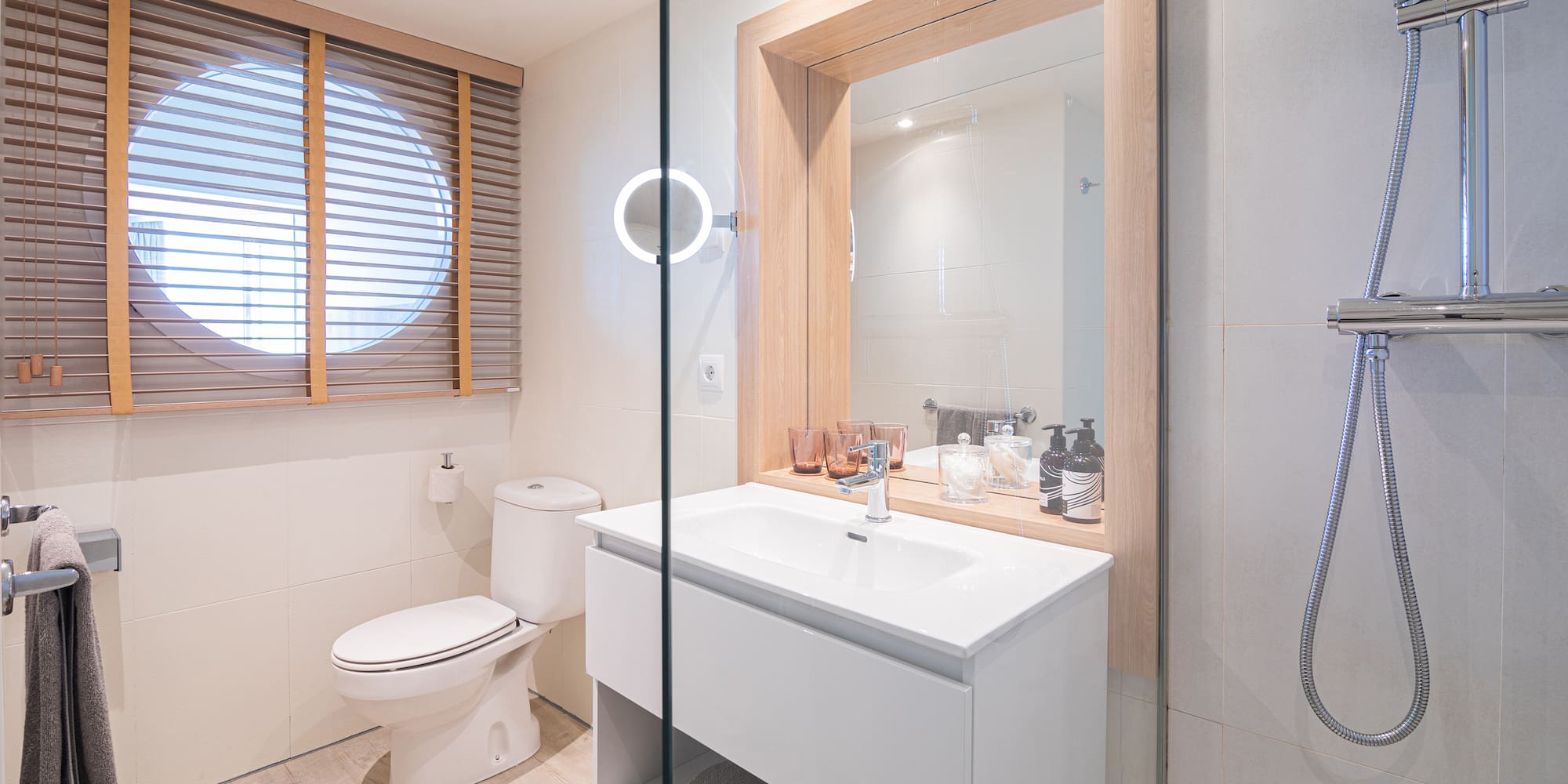 a bathroom with a glass door