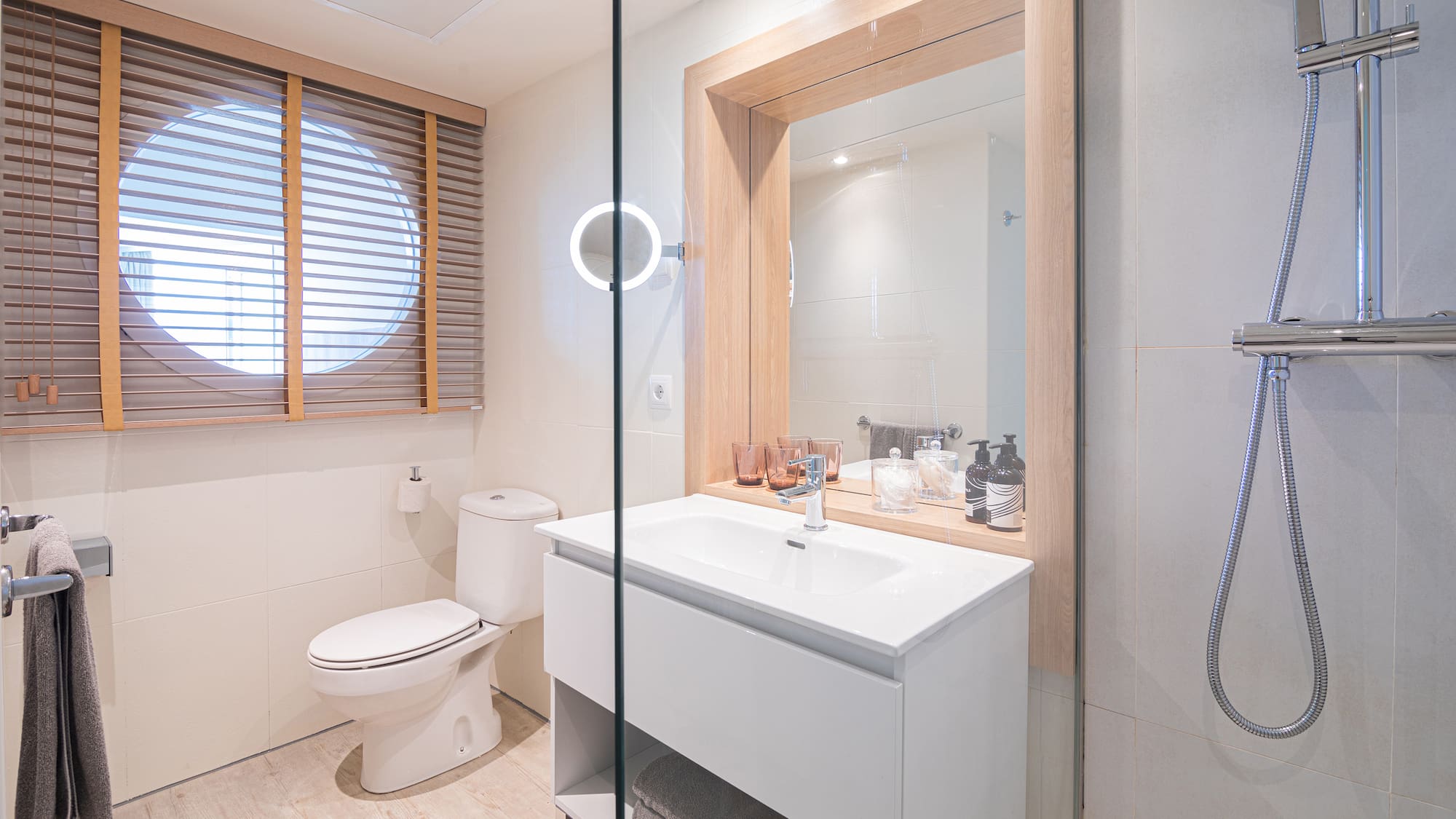 a bathroom with a glass door