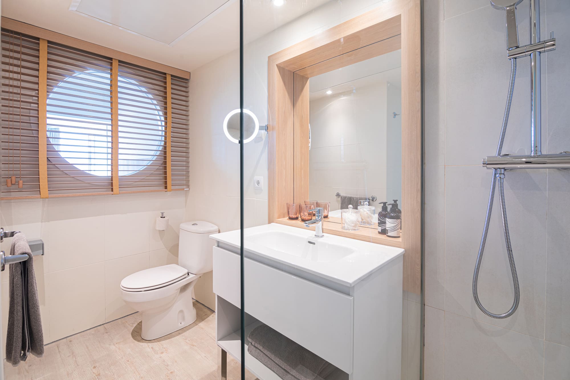 a bathroom with a glass door