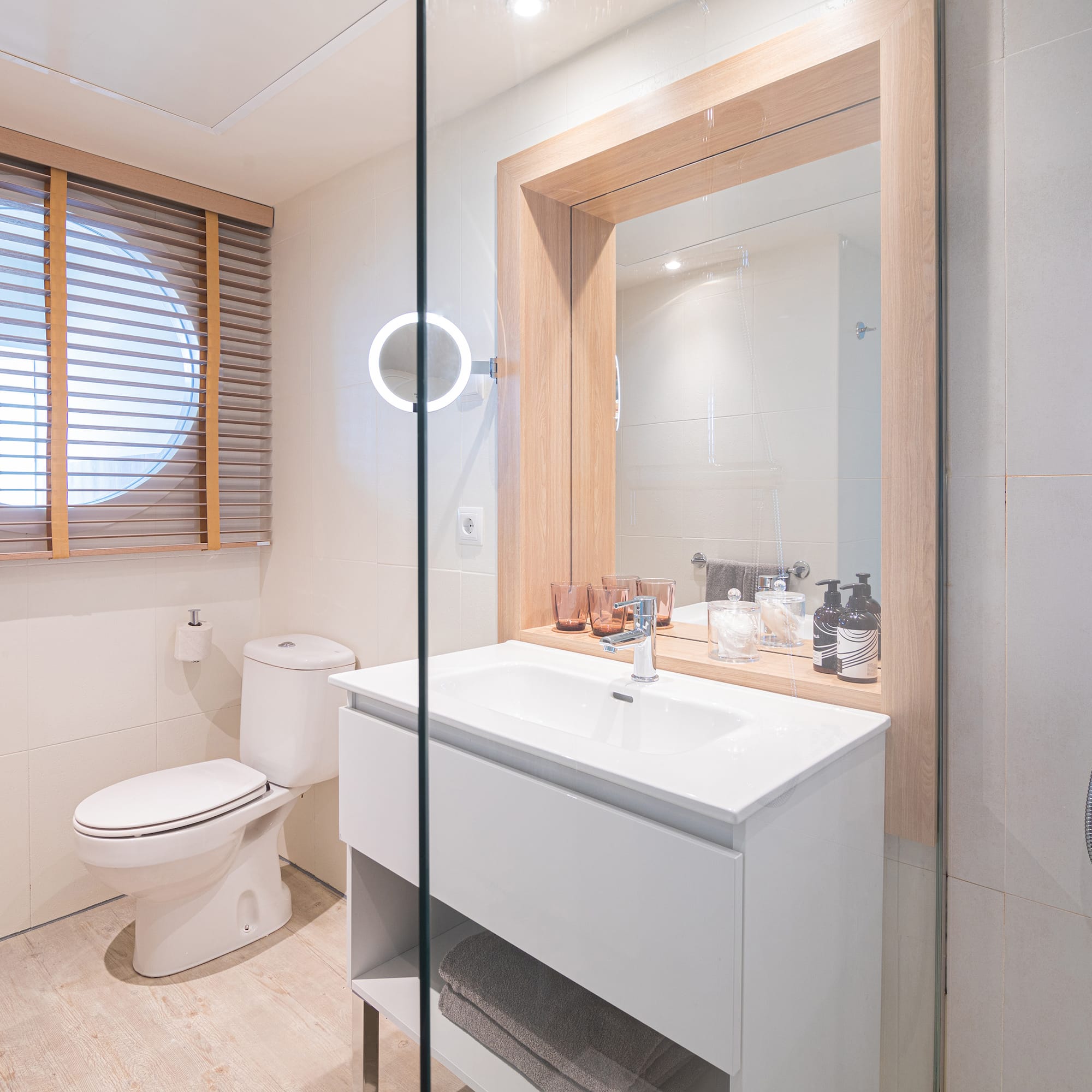 a bathroom with a glass door