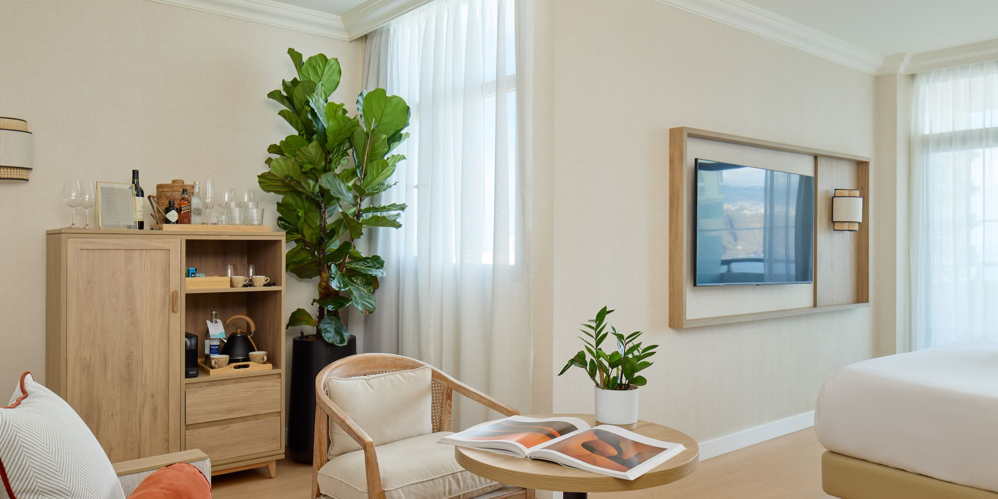 a room with a tv and a chair