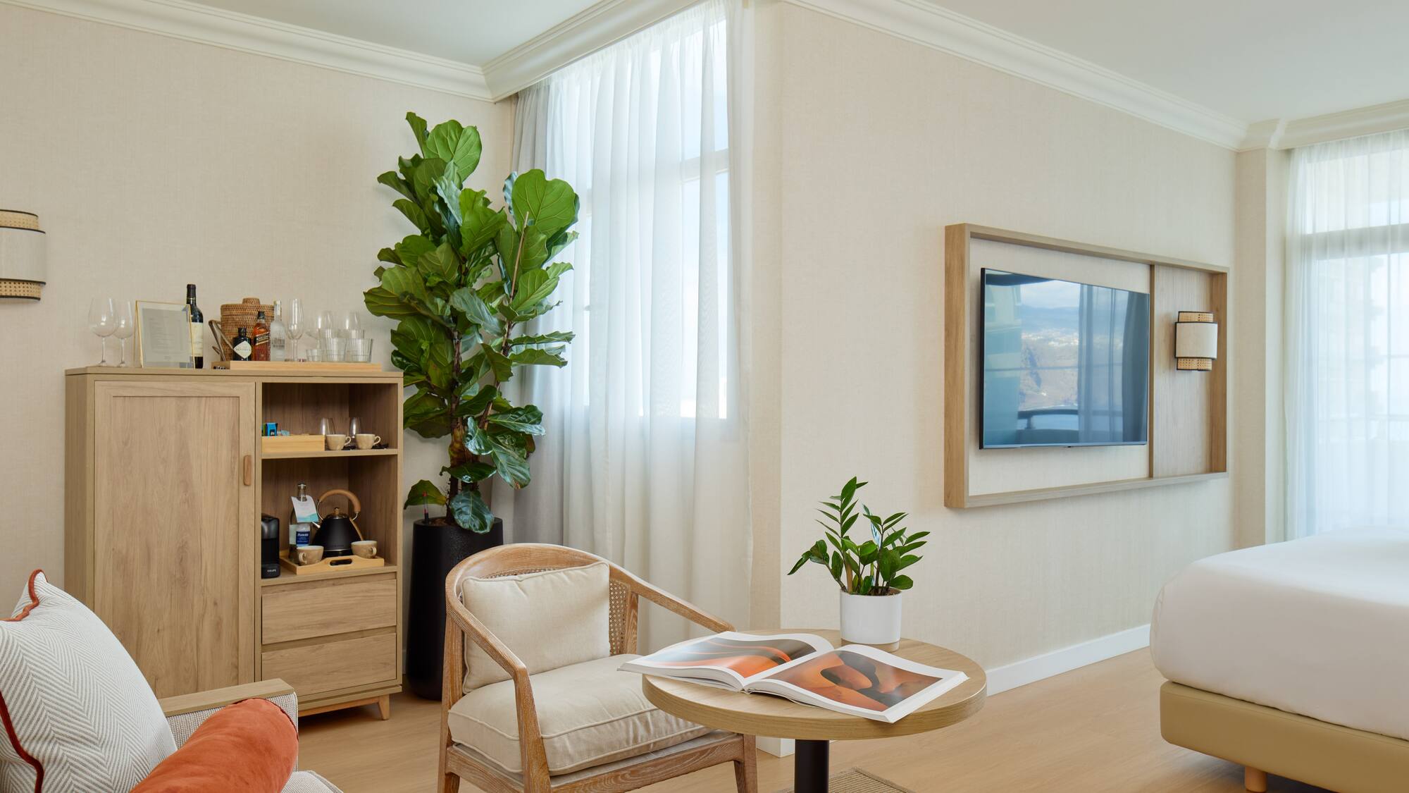 a room with a tv and a chair