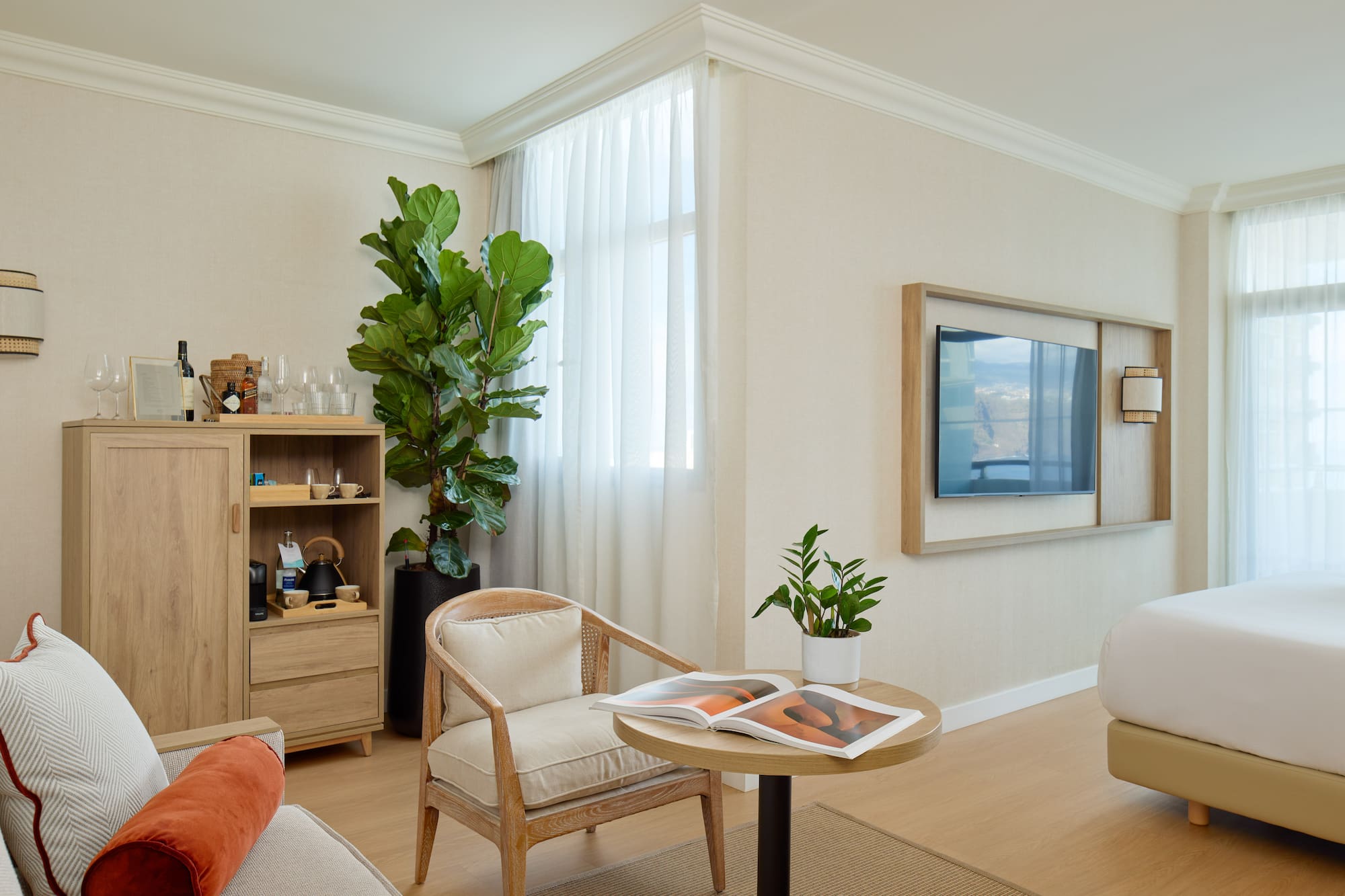 a room with a tv and a chair