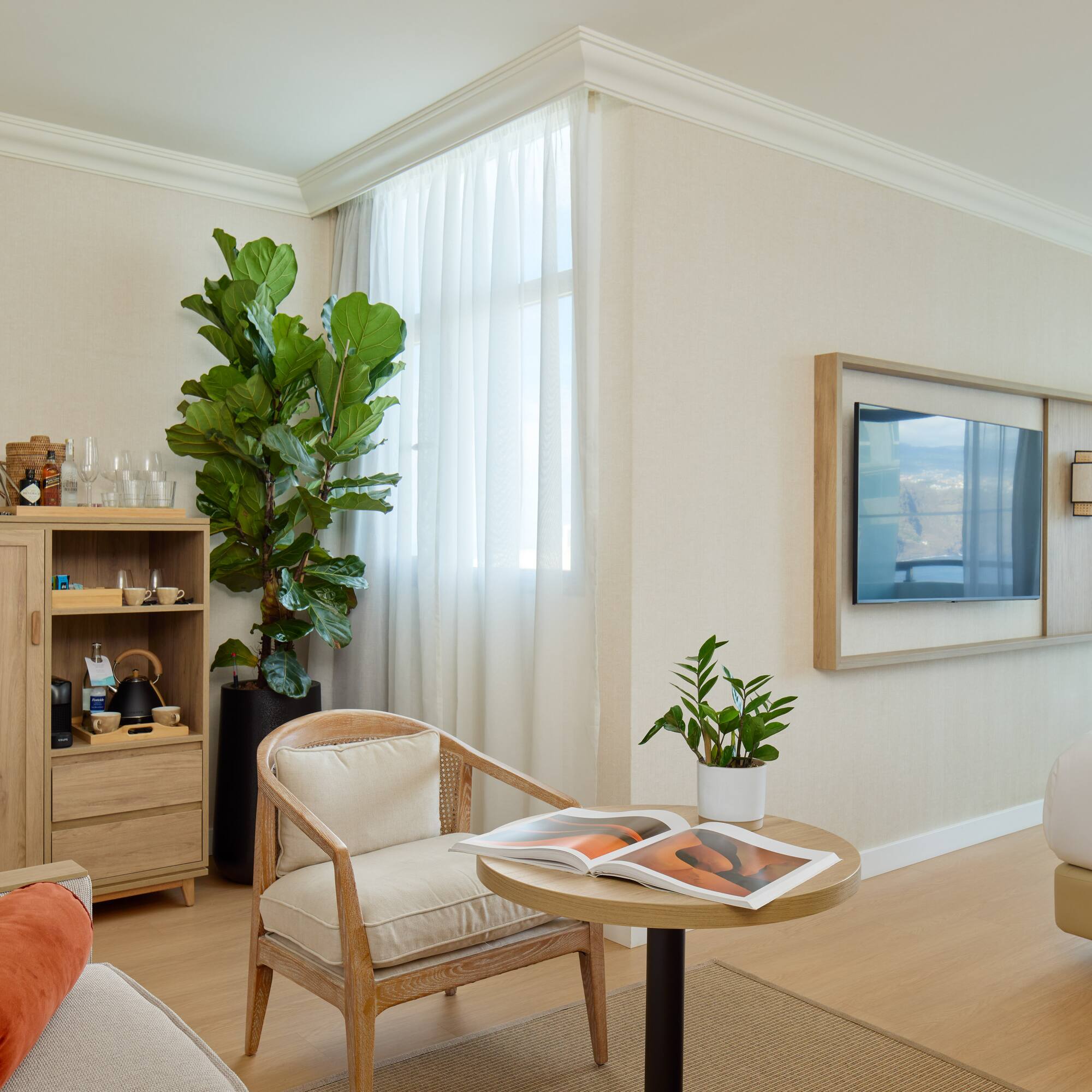 a room with a tv and a chair