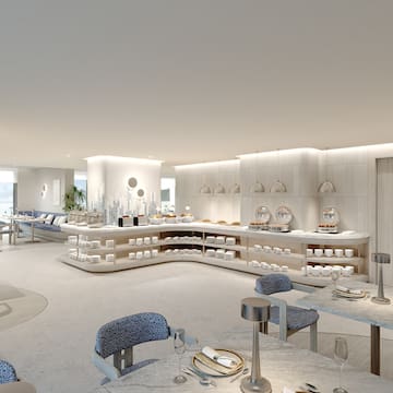 a room with a buffet and a table