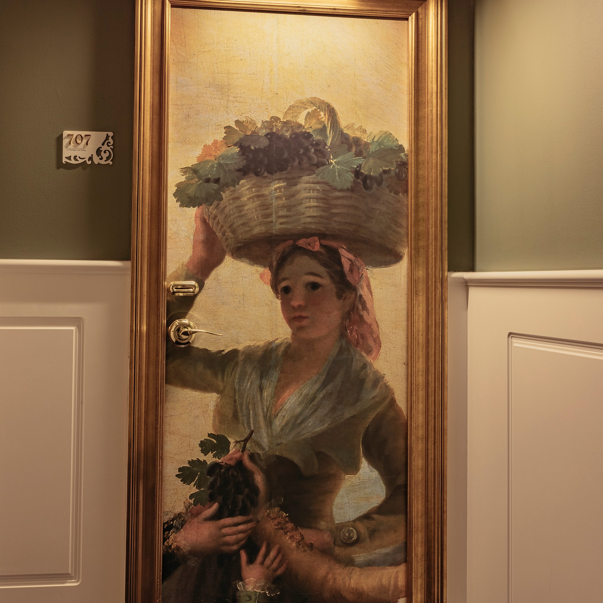 a painting of a woman holding a basket of fruits on her head