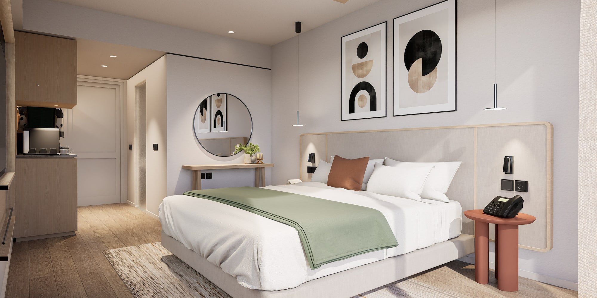 a bedroom with a bed and artwork on the wall