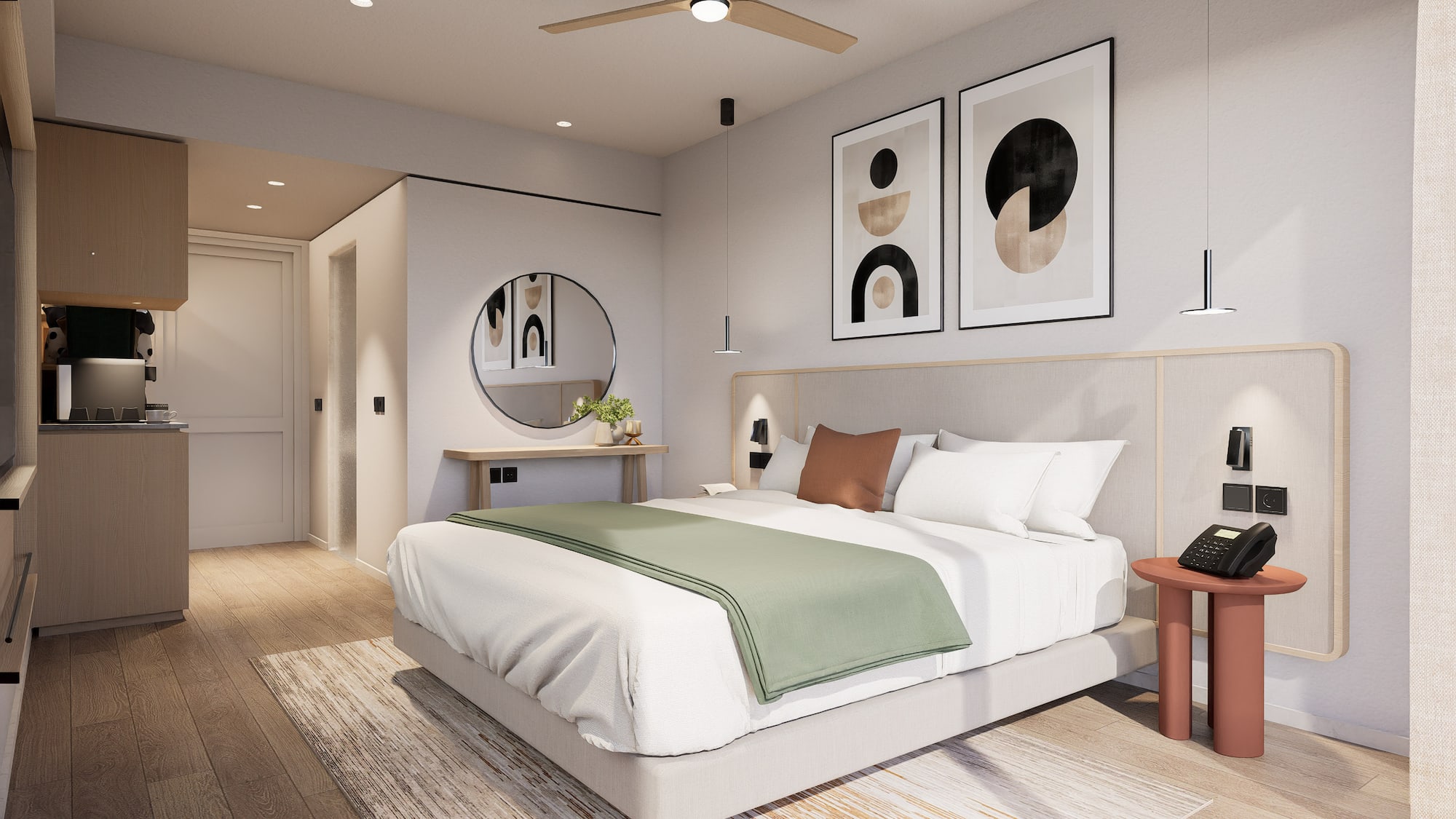 a bedroom with a bed and artwork on the wall