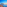 Luxury ocean view balcony with palm trees, sunset sky, and resort pool.