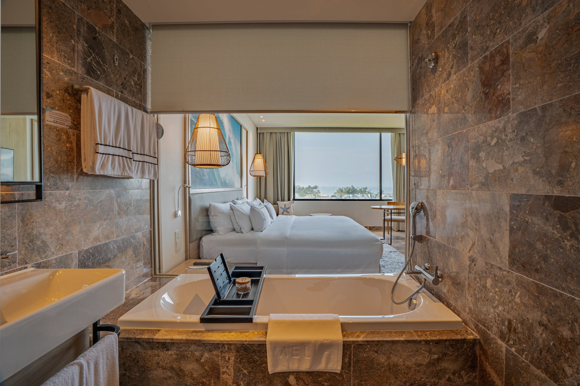 a bathroom with a bed and a bathtub