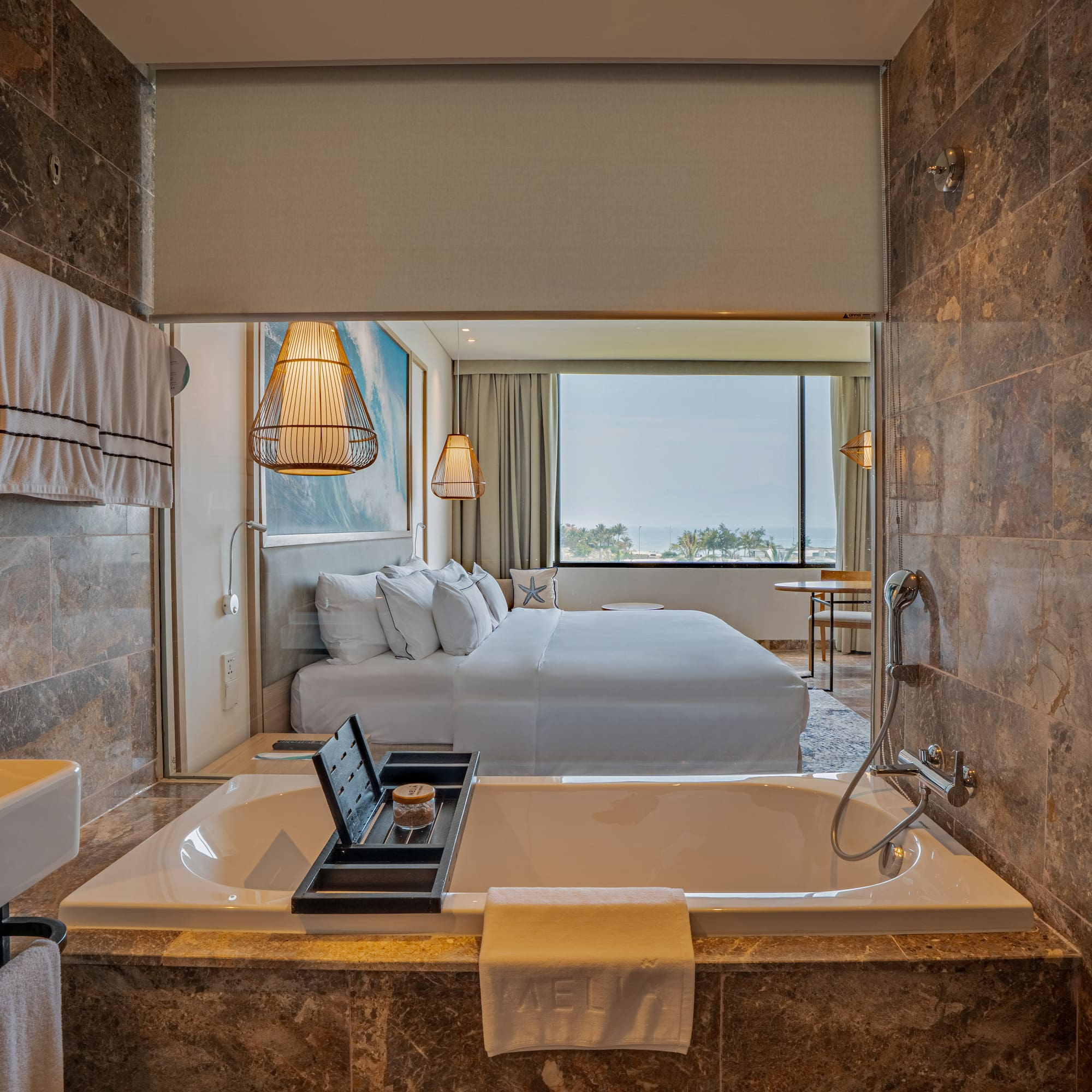 a bathroom with a bed and a bathtub