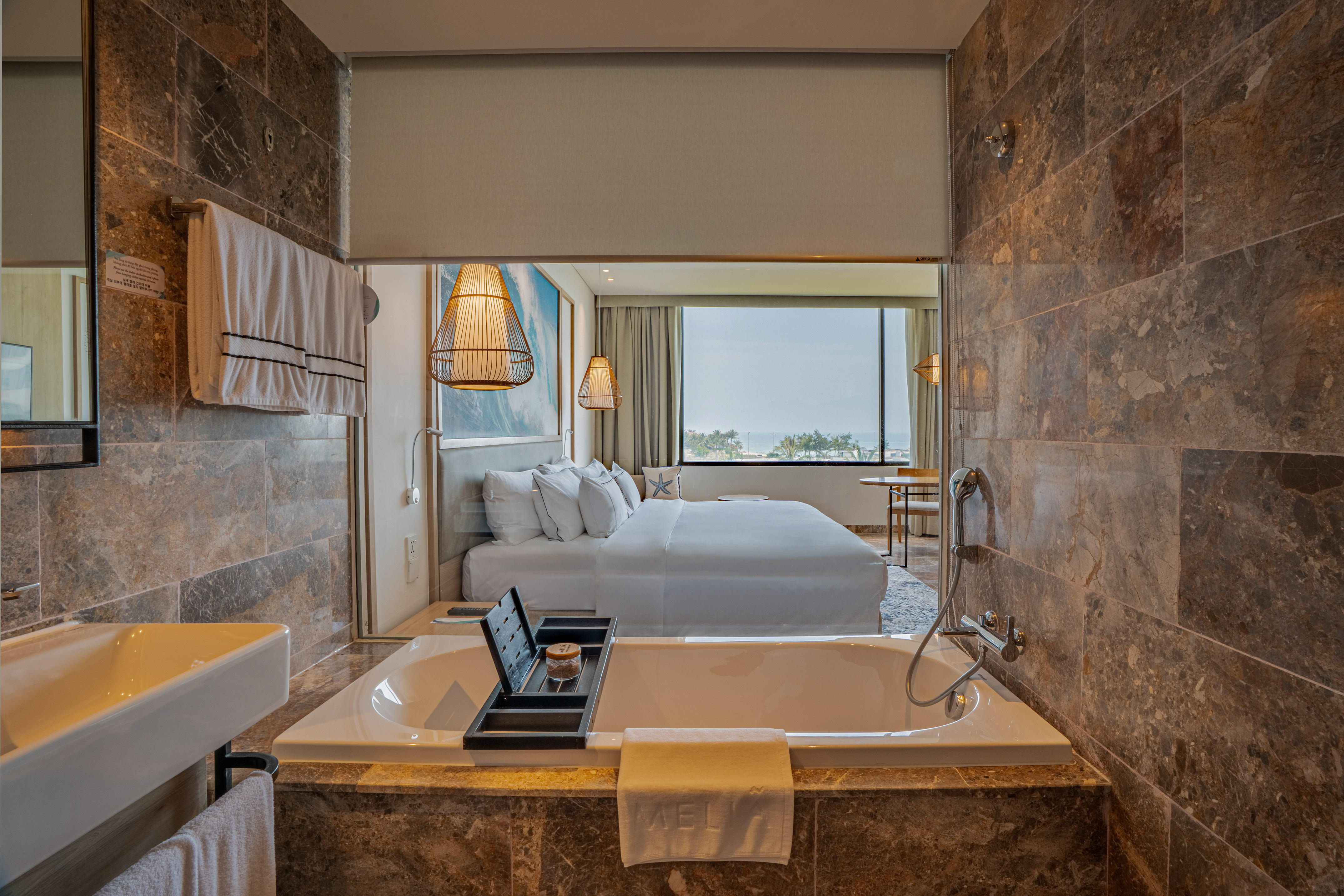 a bathroom with a bed and a bathtub