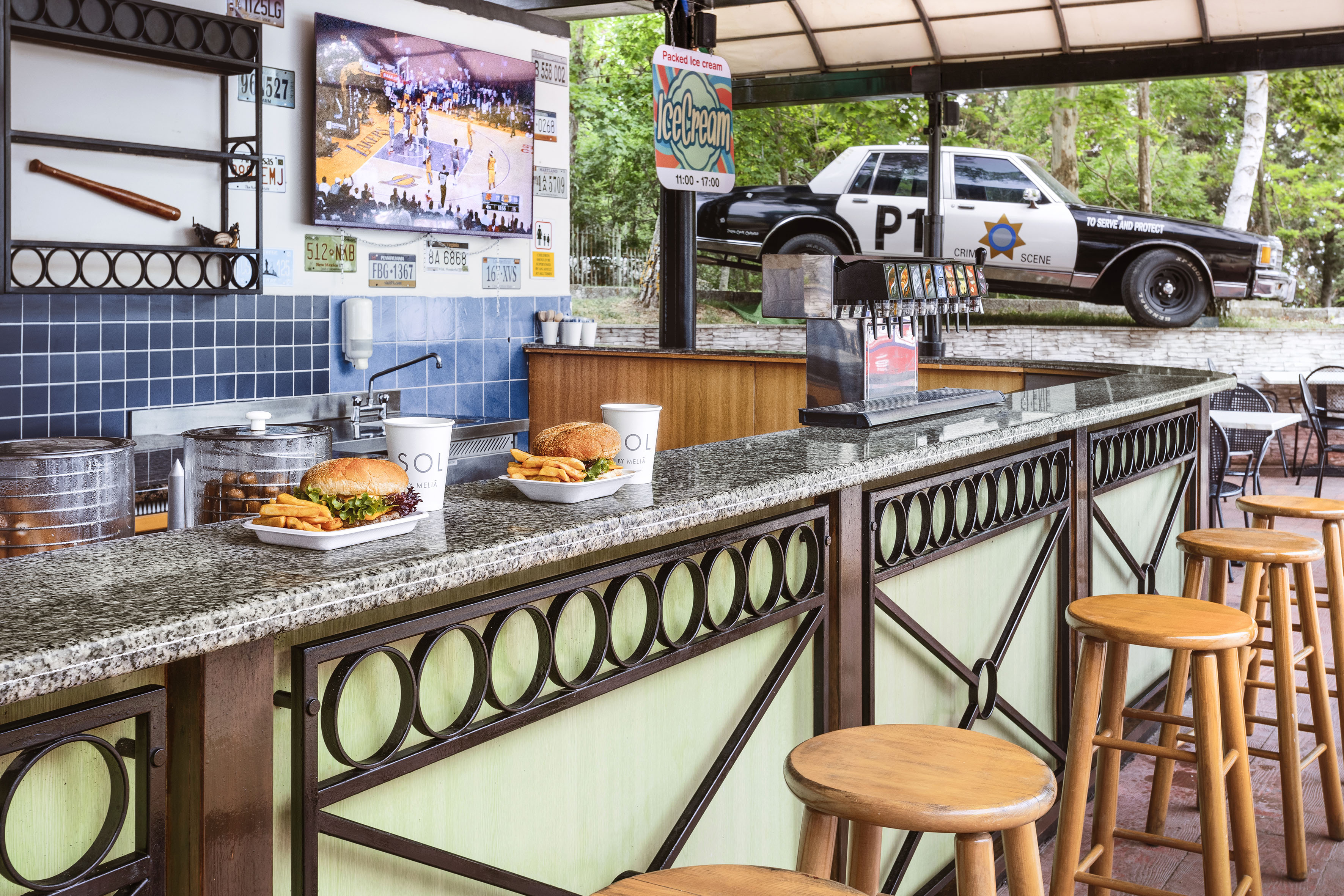 a counter with food and drinks on it