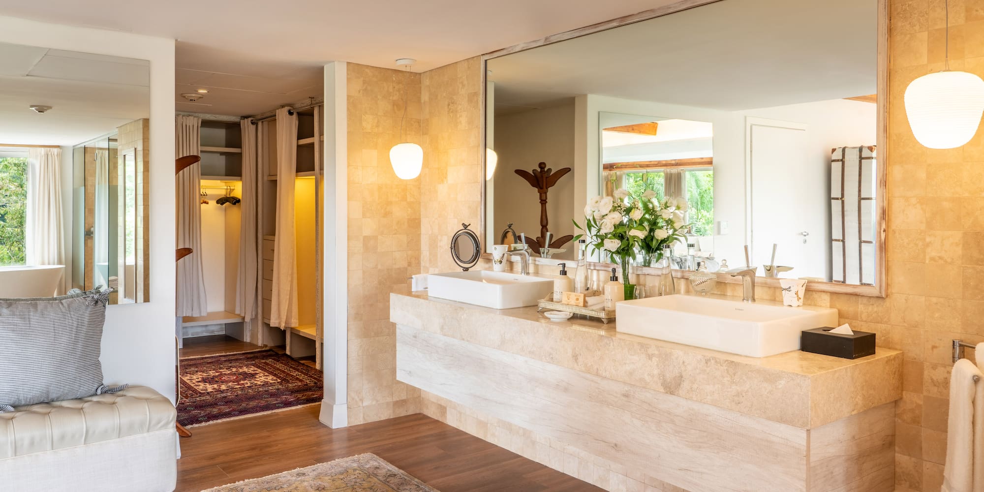 a bathroom with a large mirror and a large sink