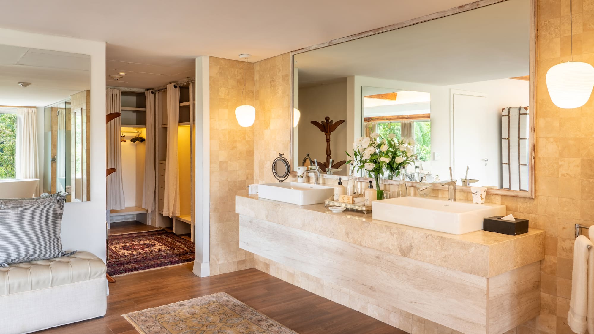 a bathroom with a large mirror and a large sink