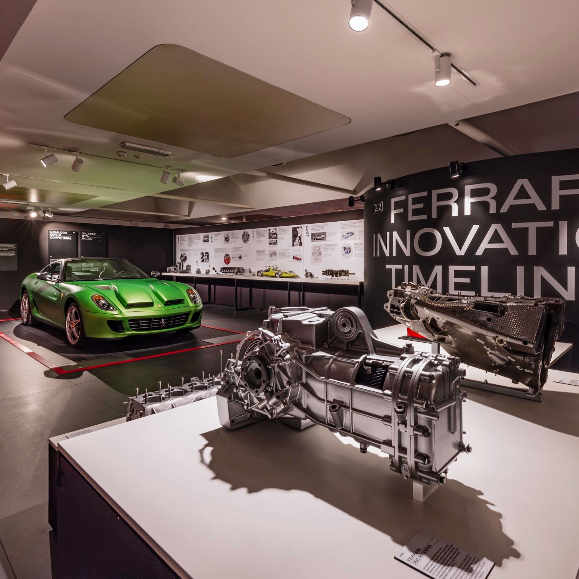 a green car in a showroom