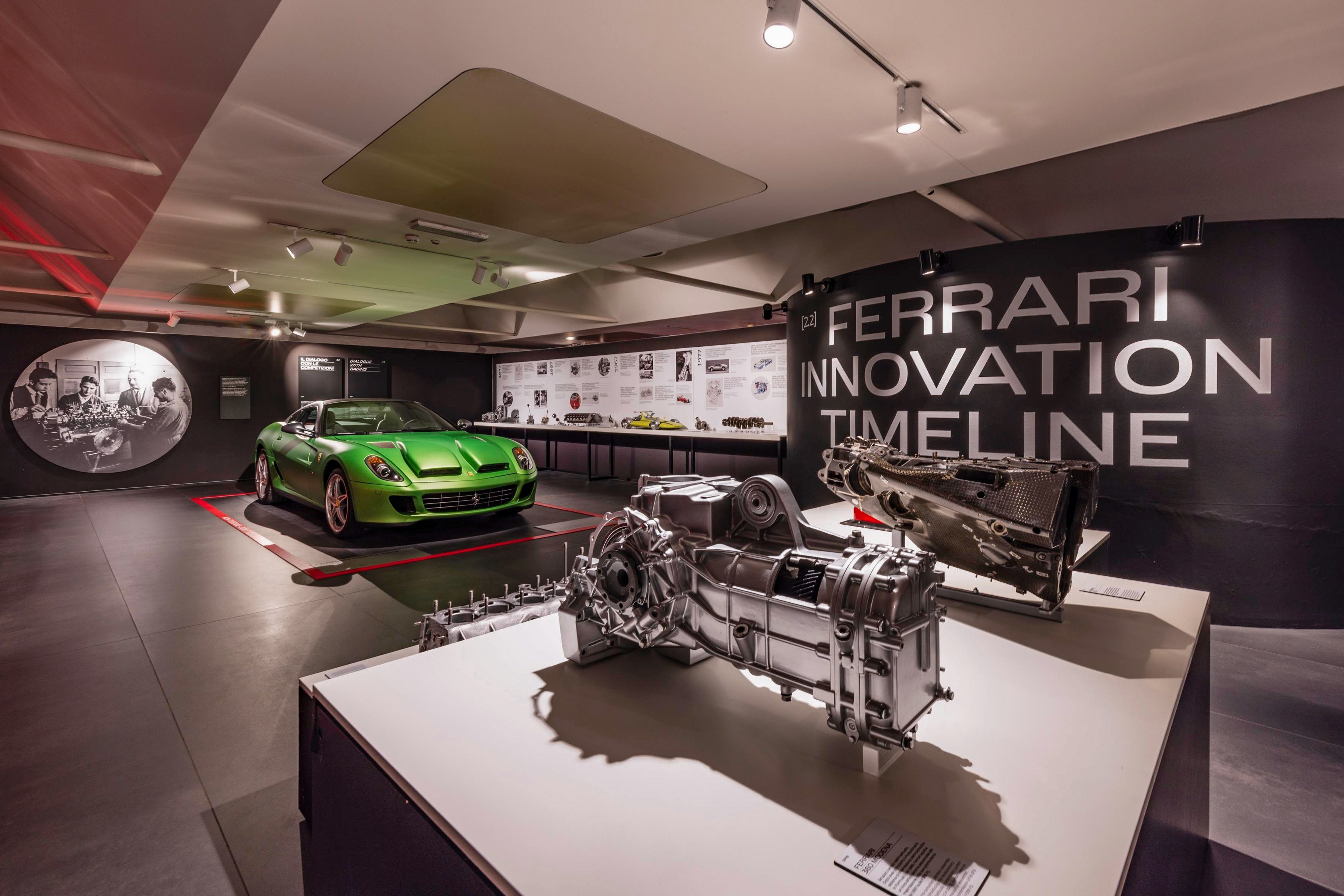 a green car in a showroom